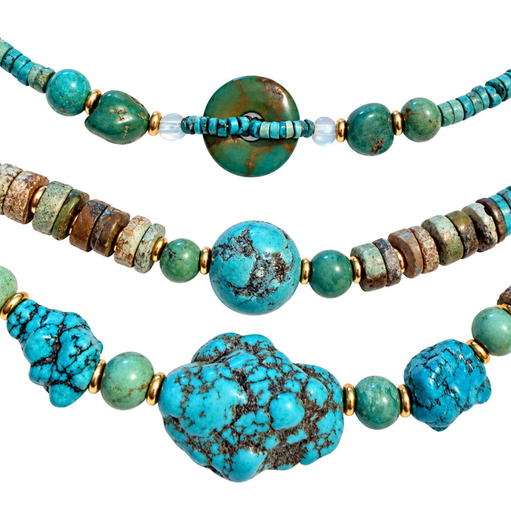 Close-up of natural turquoise stones and beads on the Turquoise Nomad Necklace