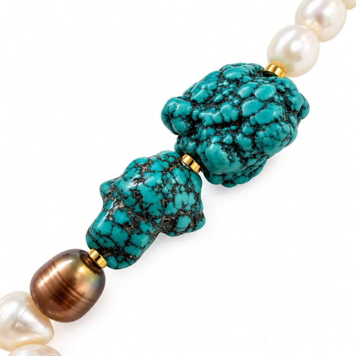 Close-up of turquoise stones and pearl details on the Turquoise Pearl Drop Necklace