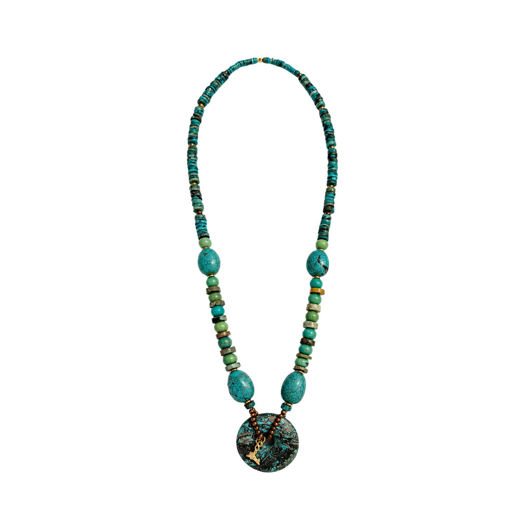 Front view of the Turquoise Talisman Necklace with natural turquoise beads and circular pendant