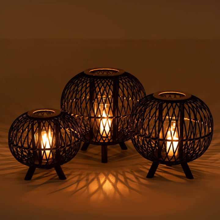 Ukulha bamboo lanterns illuminated, creating warm ambient glow
