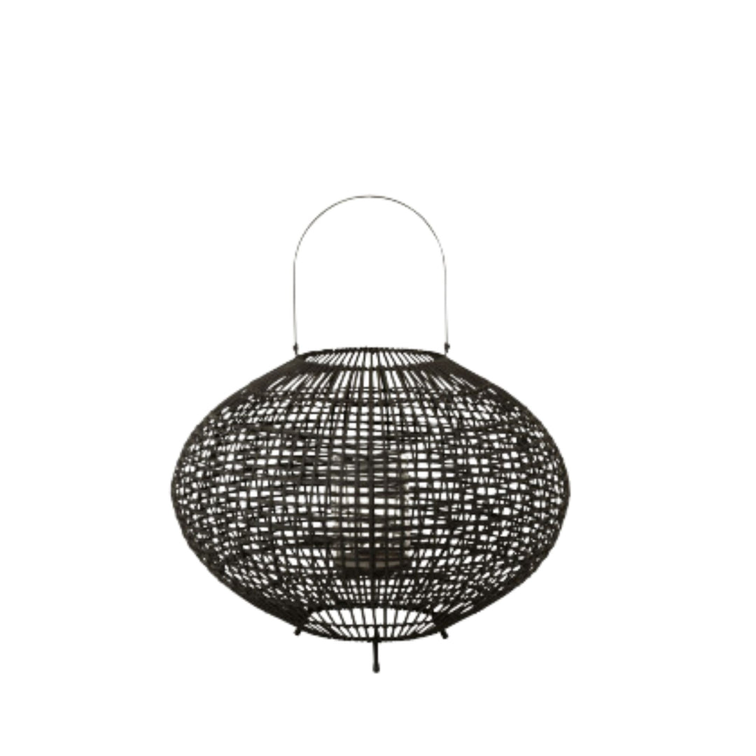 Front view of Ulov lantern highlighting its rounded woven bamboo and rattan structure.