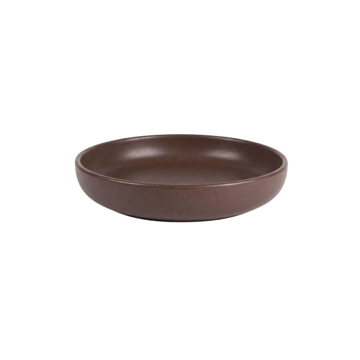 Side view of Uno Choco bowl highlighting depth and handcrafted ceramic texture.