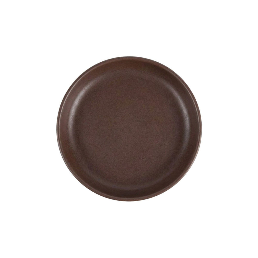 Top view of Uno Choco bowl highlighting depth and handcrafted ceramic texture.