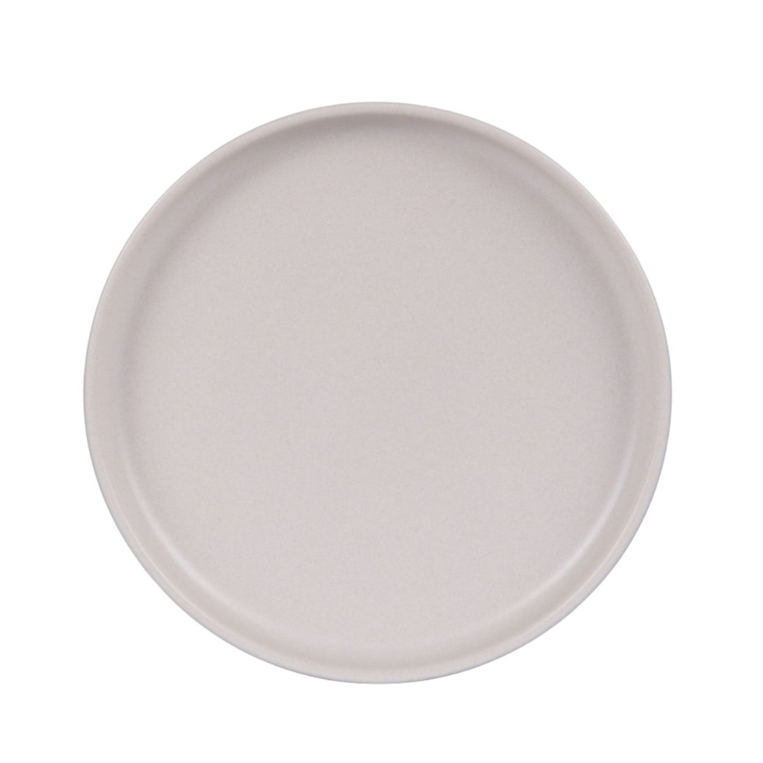 Top view of cream ceramic plate showing clean lines and soft matte finish.