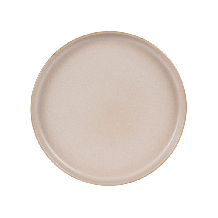 Top view of sand-colored ceramic plate with soft matte texture.