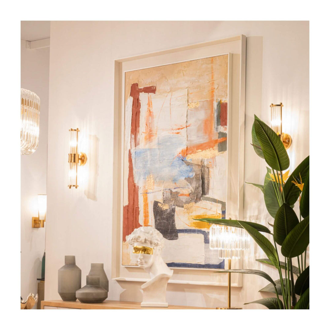 Urban Spirit Painting displayed in an elegant room with brass lighting and plants, showcasing its textured abstract brushstrokes in warm and cool tones.