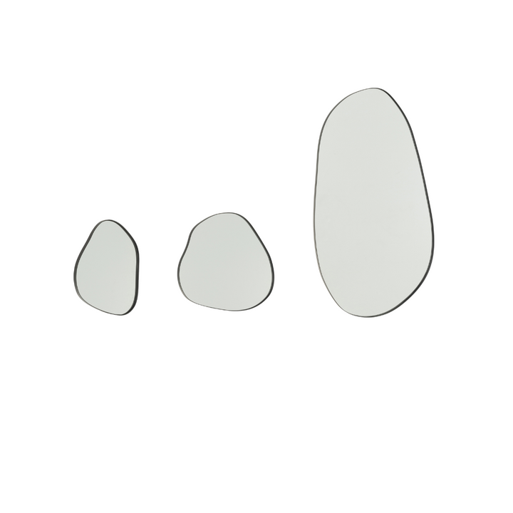 Utara Iron Mirror set with black frames in organic shapes.