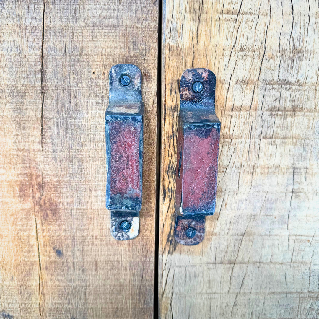 Close-up detail of reclaimed wood grain, natural marks, and aged finish.