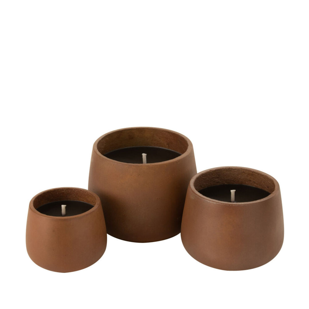 Group of Vamizi Brown Candles displayed together in different sizes.