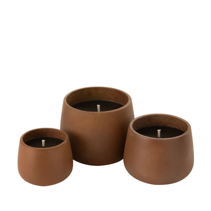 Group of Vamizi Brown Candles displayed together in different sizes.
