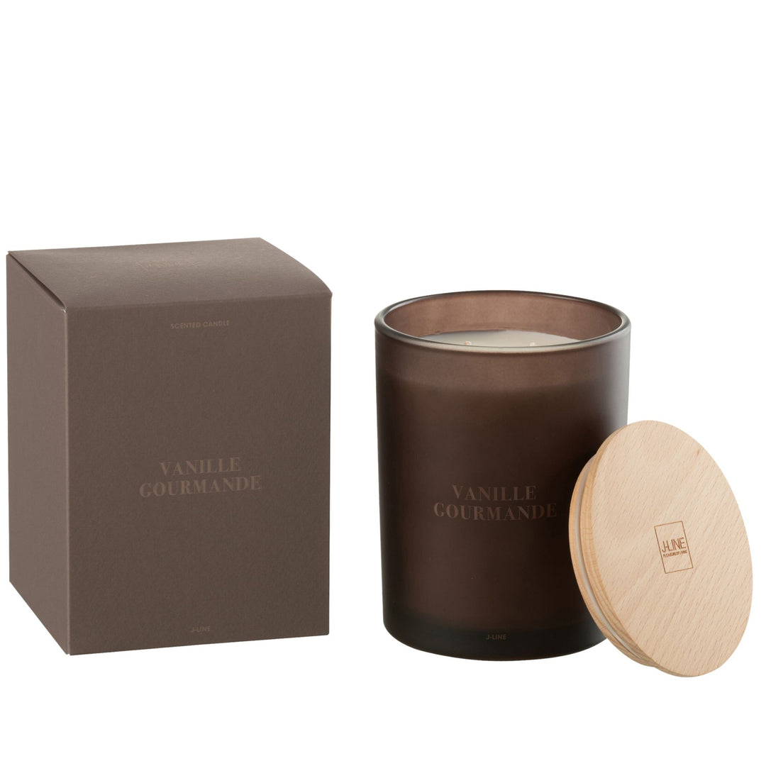 Front view of the Vanille Gourmande scented candle in dark amber glass with wooden lid.