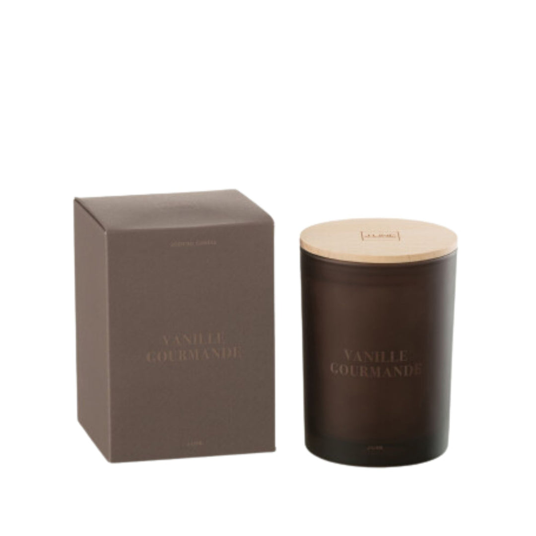 Front view of the Vanille Gourmande scented candle in dark amber glass with wooden lid.