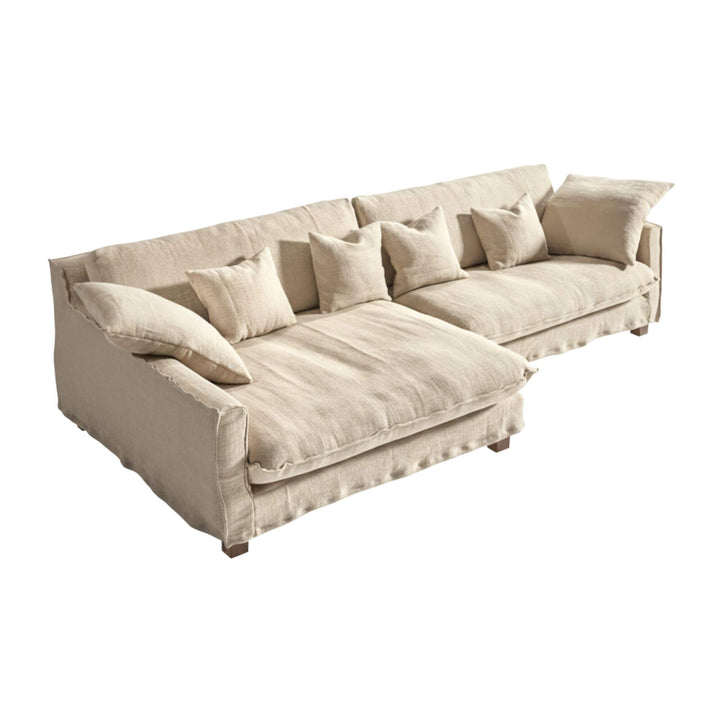 Full view of the Venezia sofa in sand linen with extended chaise longue.