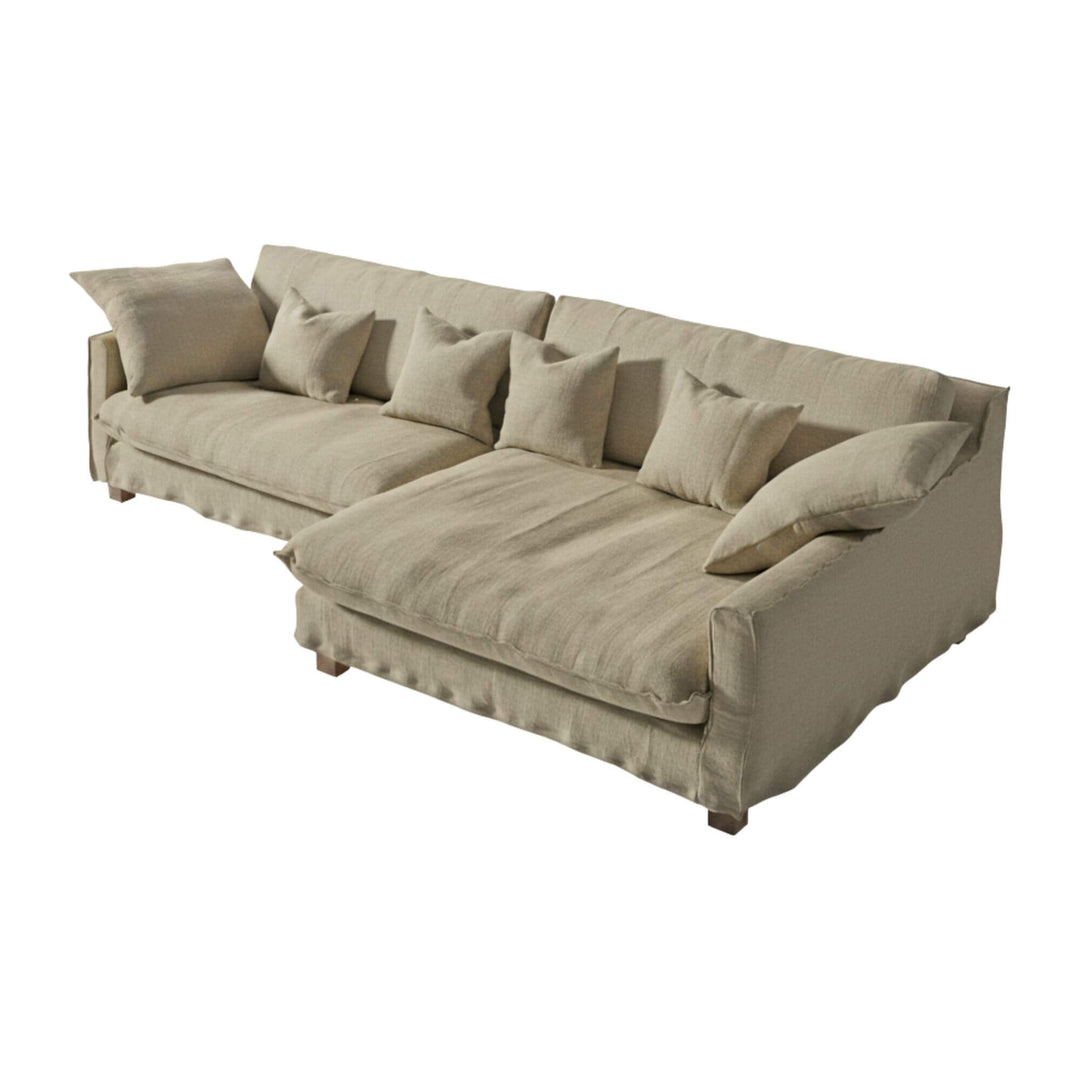 Full view of the Venezia sofa in natural linen with extended chaise longue.