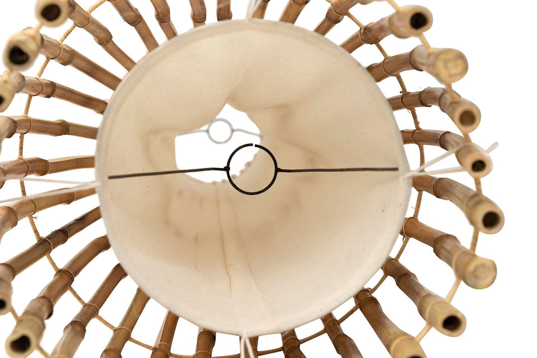 Top view of woven diffuser and bulb housing on Vessel Floor Lamp
