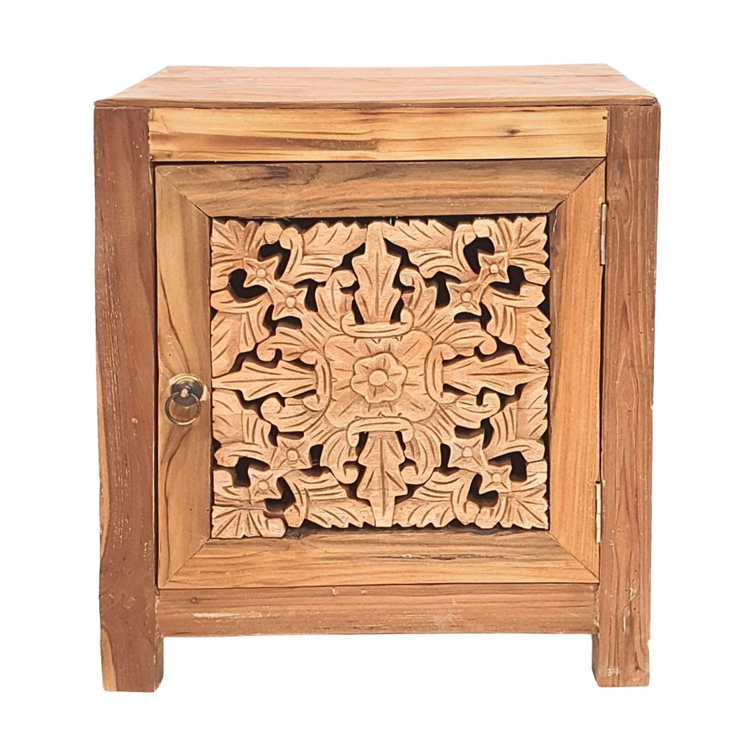 Front view of Vesta carved reclaimed teak side table with ornate door