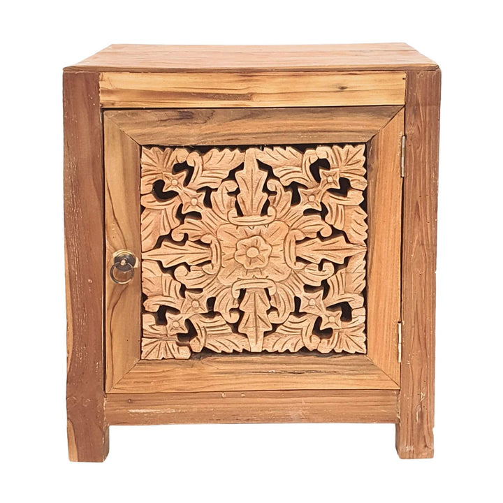 Front view of Vesta carved reclaimed teak side table with ornate door