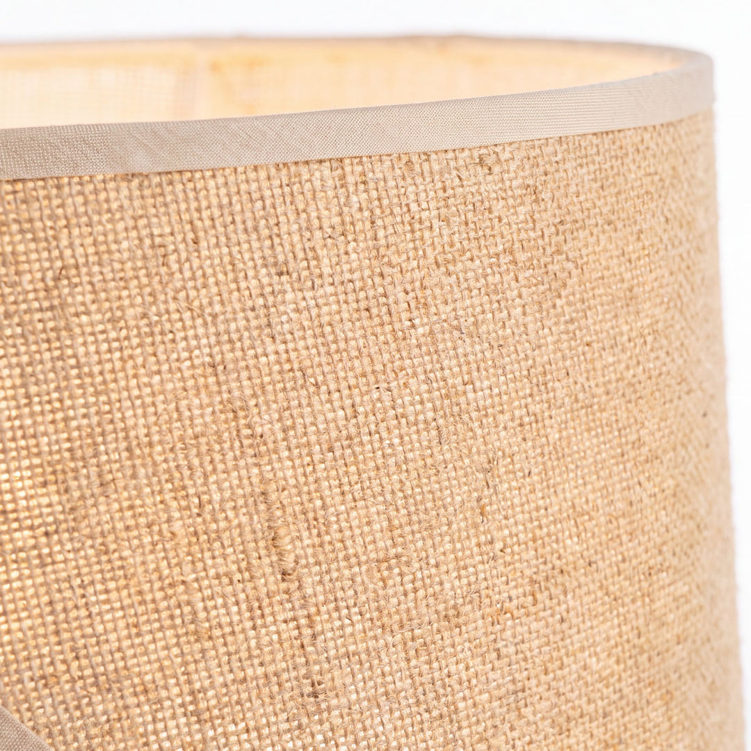 Close-up detail of the jute lampshade showing its woven texture and warm beige tone.