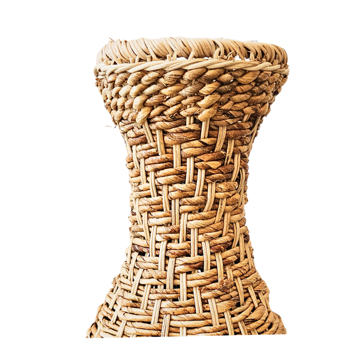 Close-up of handwoven rattan and banana leaf texture on Volpe basket