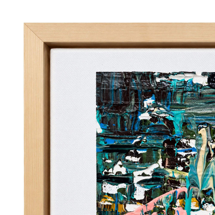Close-up of the Whispering Tides painting highlighting the artist signature, natural wood frame, and layered abstract composition