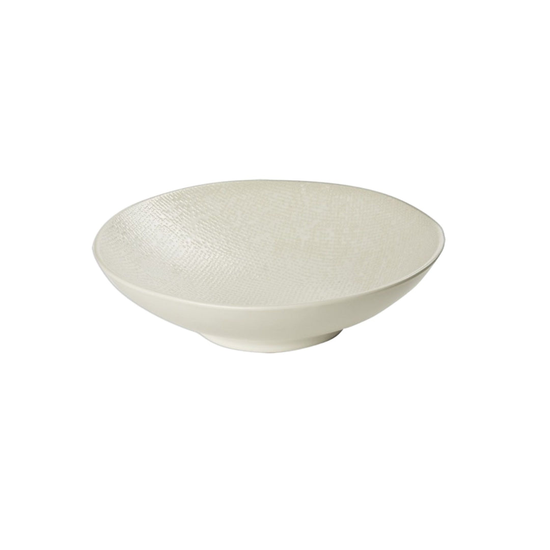White ceramic bowl with textured exterior from the Vesuvio series.