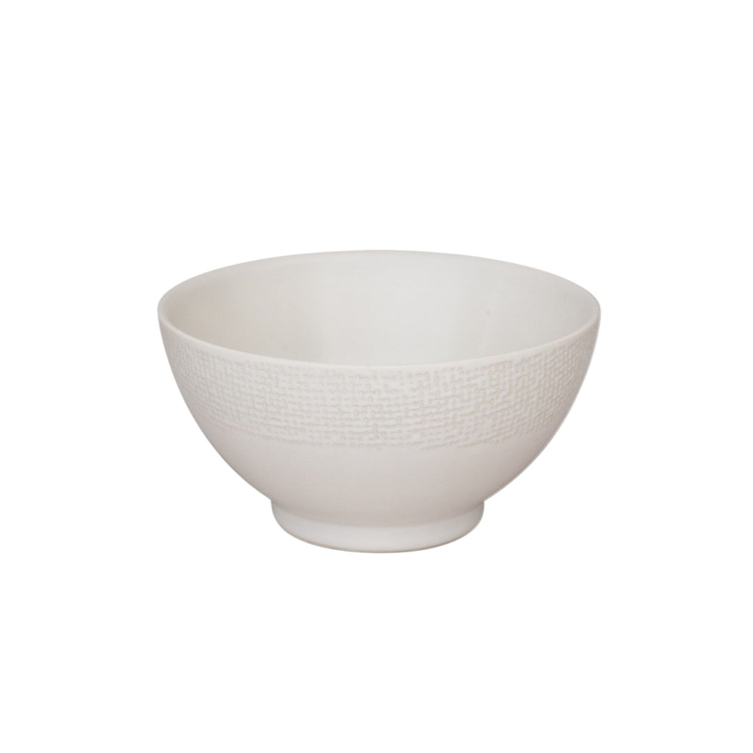 White ceramic bowl with textured exterior from the Vesuvio series.