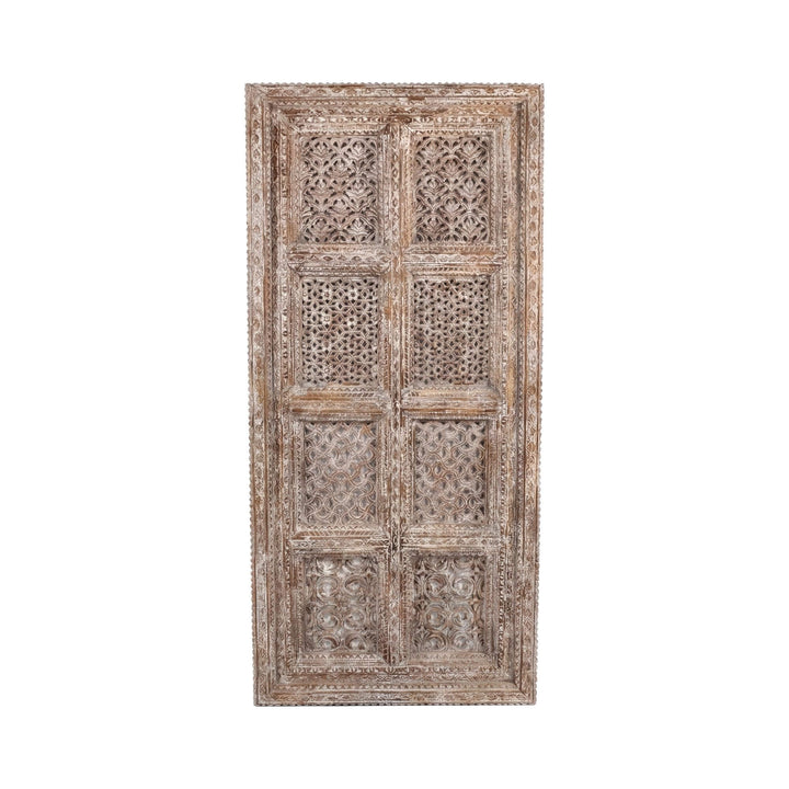 Front view of the window carved reclaimed wood panel with intricate decorative patterns.
