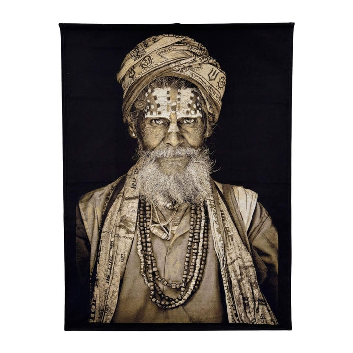Front view of the Wise Baba Man tapestry featuring a detailed tribal portrait on black fabric.
