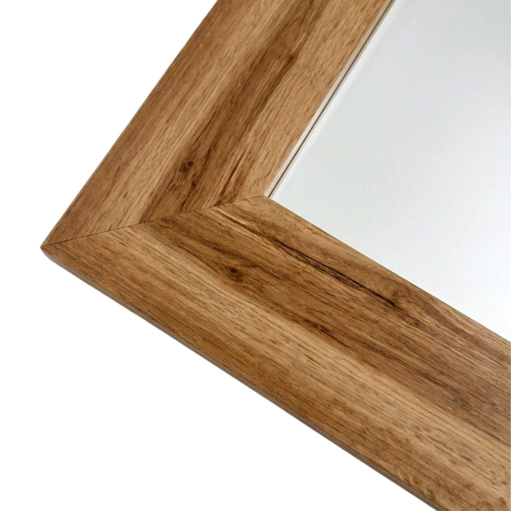 Close-up detail of the wooden frame corner highlighting the natural grain and texture.