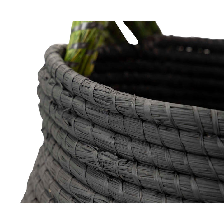 Close-up of Yachar Basket showing the green braided rim and woven detail.