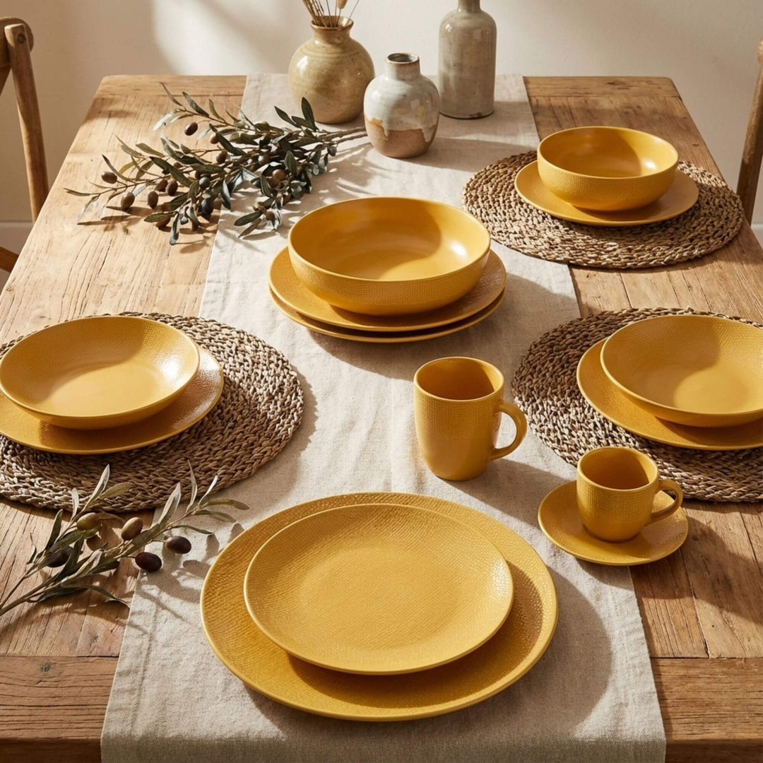 Styled dining table featuring the Yellow Vesuvio ceramic tableware collection.
