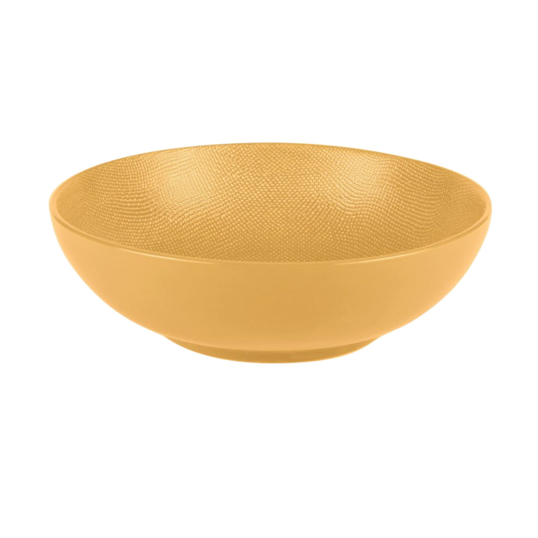 Yellow Vesuvio ceramic saladier with smooth interior and textured exterior.