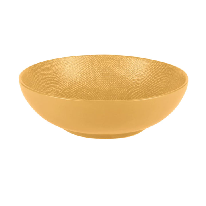 Yellow Vesuvio ceramic saladier with smooth interior and textured exterior.