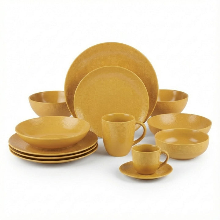 Yellow Vesuvio ceramic tableware set with plates, bowls, cups, and mugs.