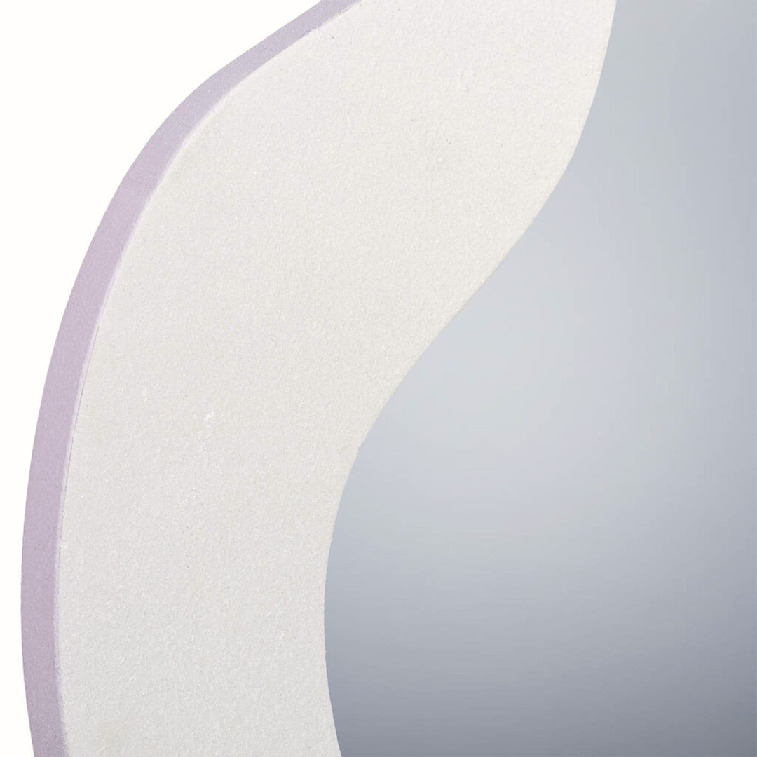 Close-up detail highlighting the soft curves and textured zinc finish.