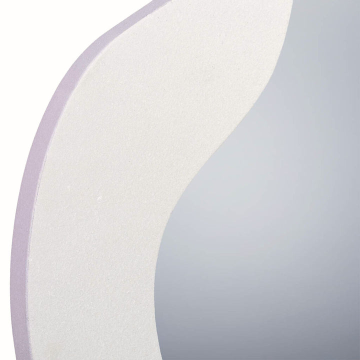 Close-up detail highlighting the soft curves and textured zinc finish.