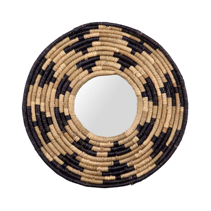 Front view of the Zuri Mirror I with a round handwoven seagrass frame in natural beige and dark contrasting tones