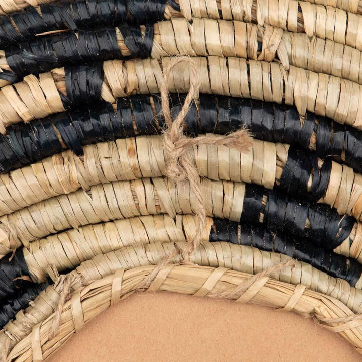 Detail of the Zuri Mirror II showing the natural woven fibers, dark pattern, and handcrafted texture