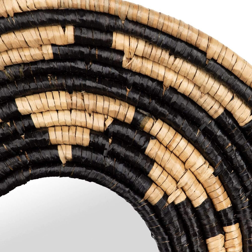 Close-up of the Zuri Mirror IV highlighting the layered seagrass weave and bold circular pattern
