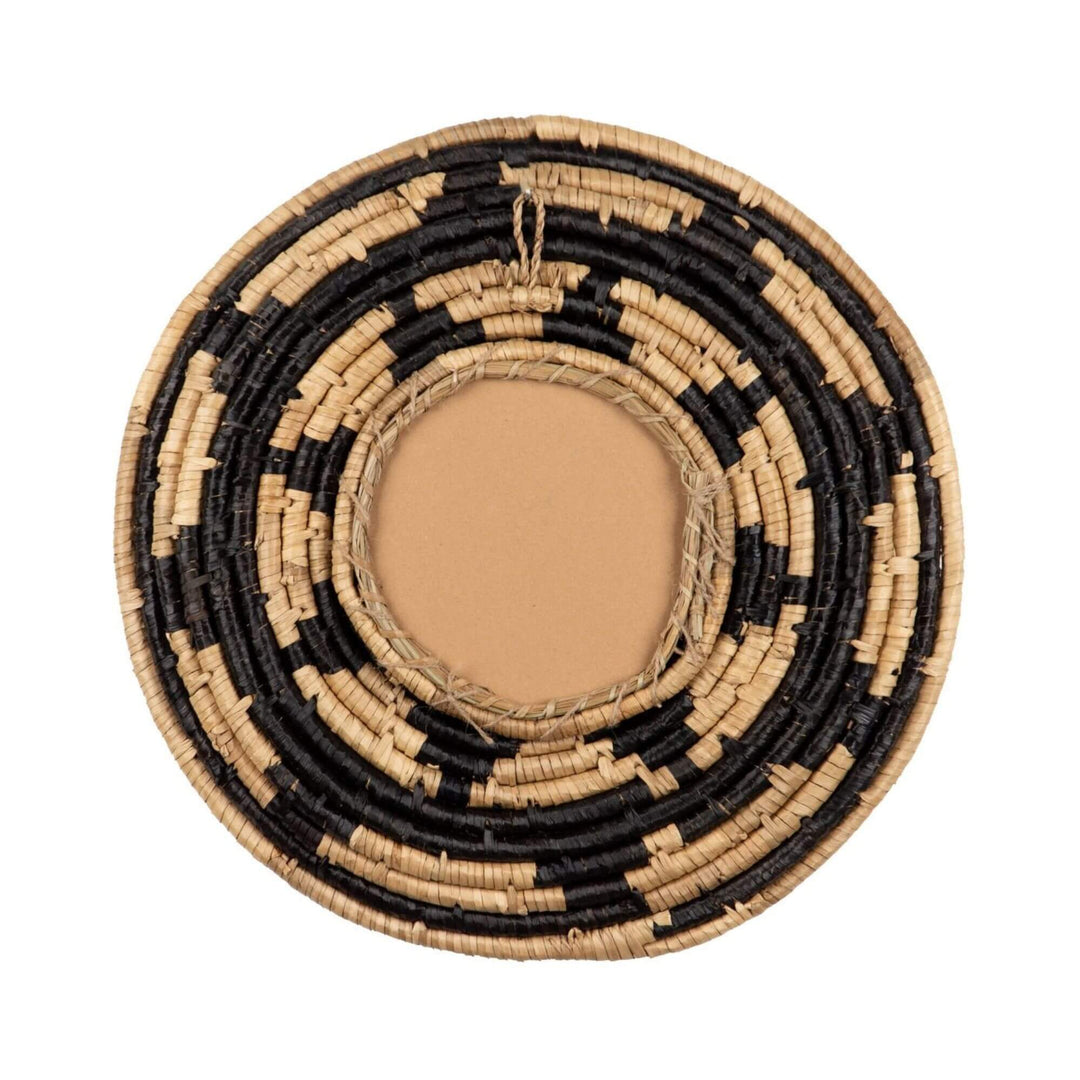 Rear view of the Zuri Mirror IV showing its round woven seagrass construction and mirror backing