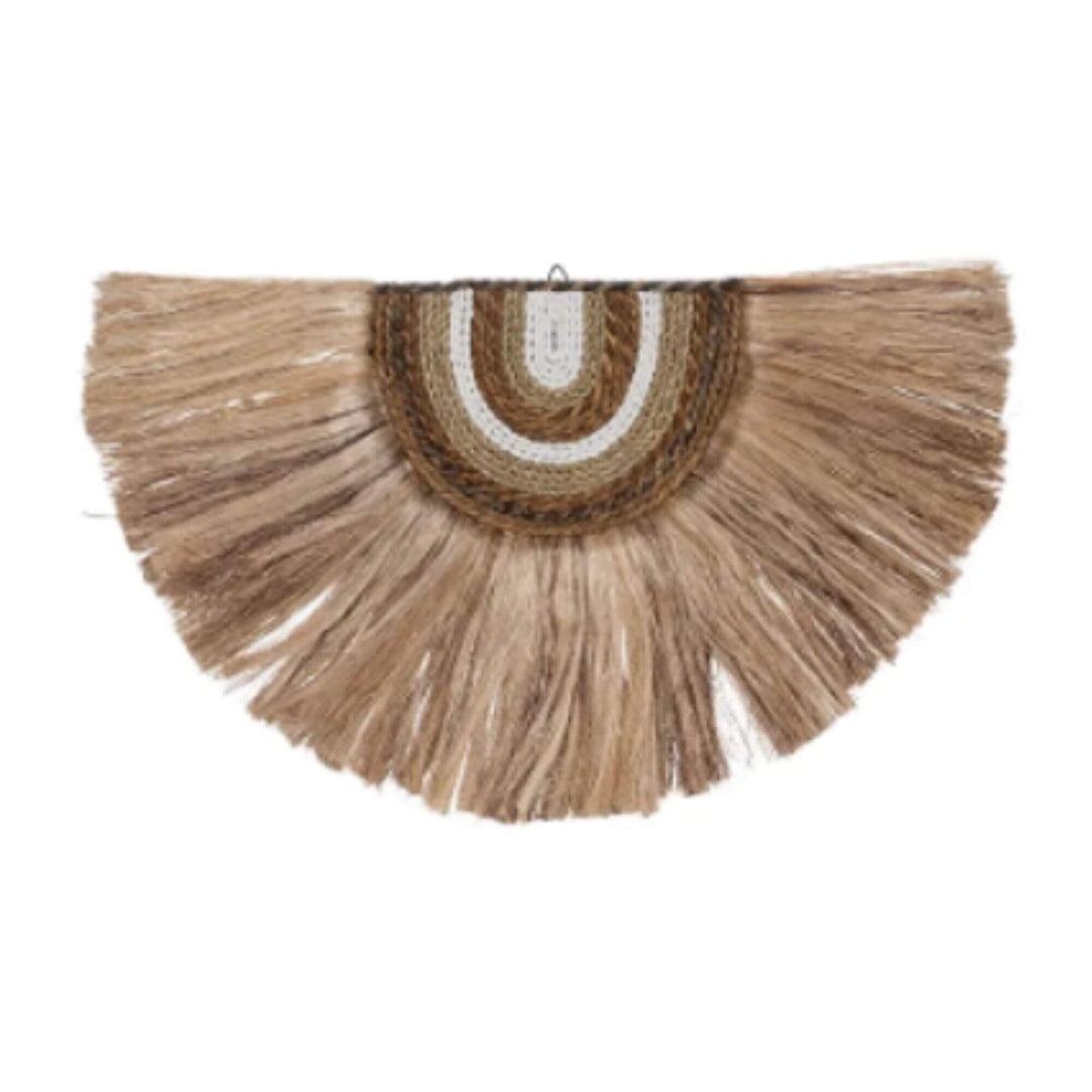 Handcrafted semi-circular wall decoration made of rattan and natural fibers with layered fringe design in natural tones.