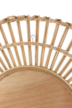 Close-up of the woven rattan cane details on the Banana Mirror frame.