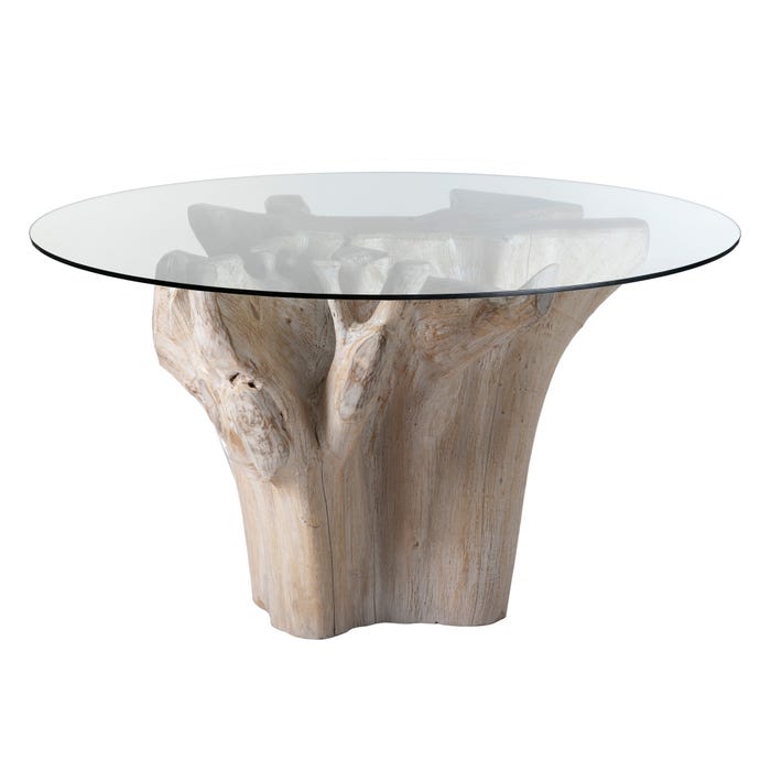 Angled view showing the sculptural teak root base of the Denpasar dining table.