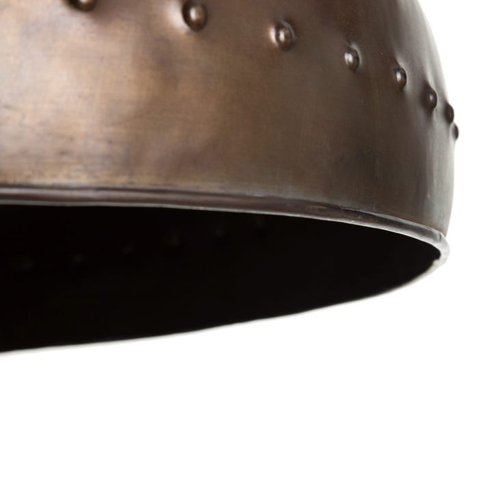 Edge view of handcrafted copper dome pendant lamp