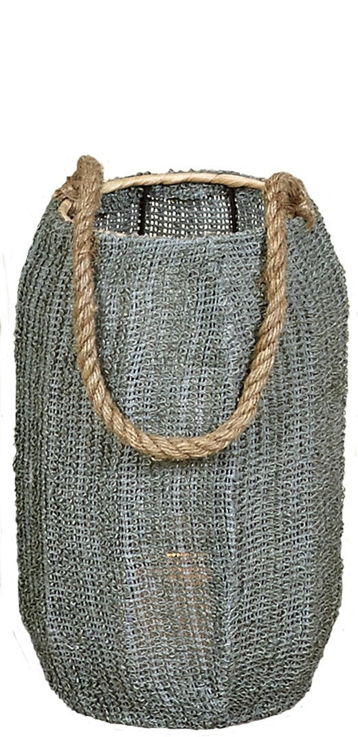 Green Oxana Lantern woven from natural fibers.