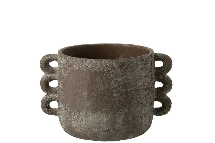 Front view of the brown rustic ceramic pot showing its cylindrical shape and handles.