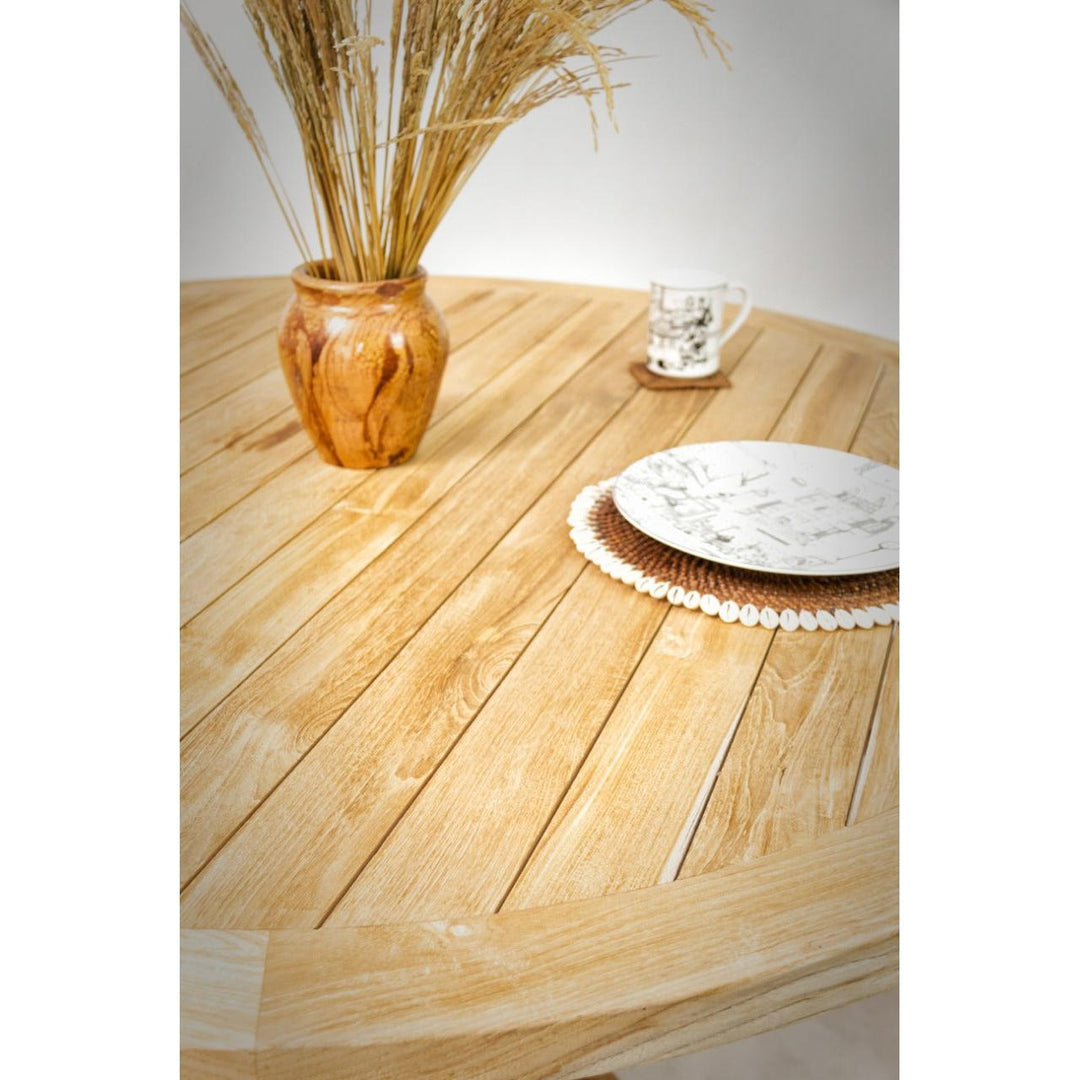 Close-up of the Tongariki table showing natural teak grain.