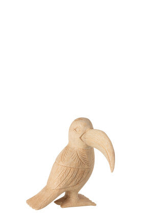 Front view of the tucan figure carved from albazia wood with natural finish.