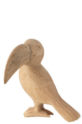 Front view of the tucan figure carved from albazia wood with natural finish.