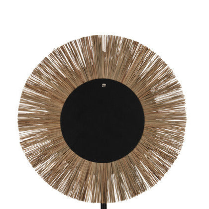 Rear view of the mirror showing wall mounting system and natural fiber construction.